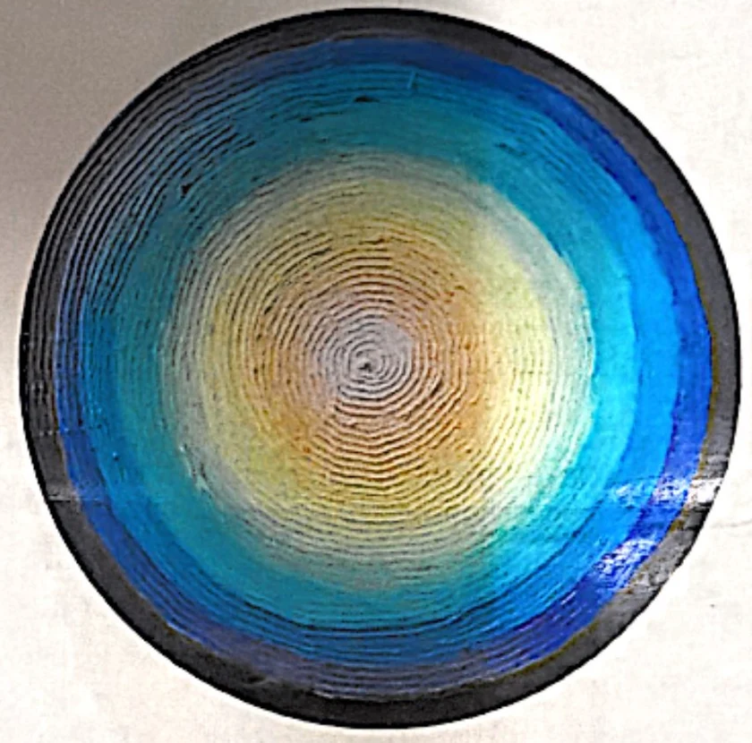 Blue, turquoise and gold circular Water Mirrors Life image from Deborah’s brochure.